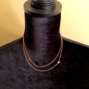 Gold necklace with small stars